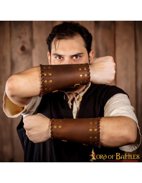 Medieval brown leather bracers with...