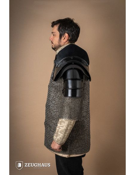 Medieval shoulder pads with sword...