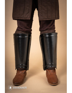 Medieval warrior greaves in burnished steel 2