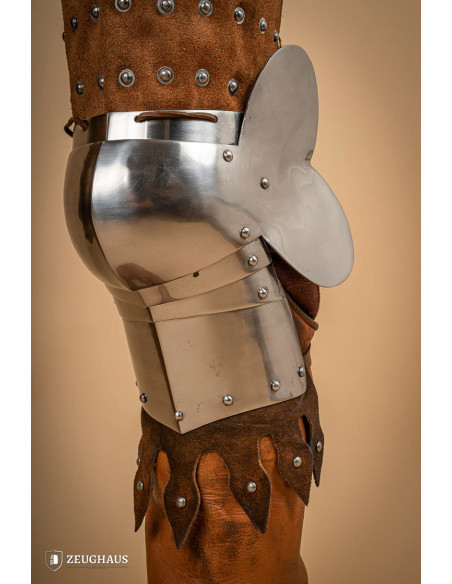 Medieval leg armor in leather and steel