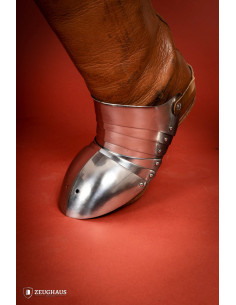 Medieval segmented scarps in polished steel