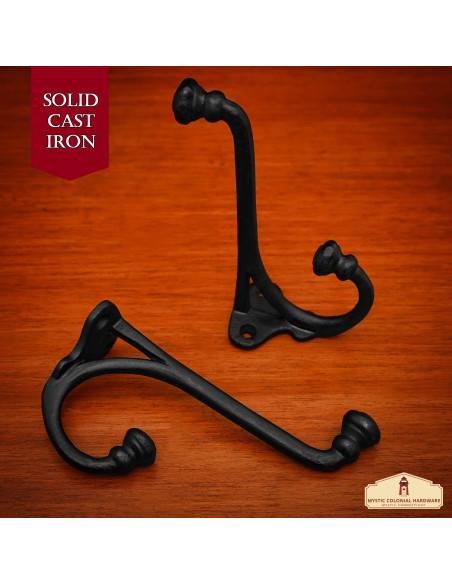 Set of 2 rustic cast iron wall hooks...