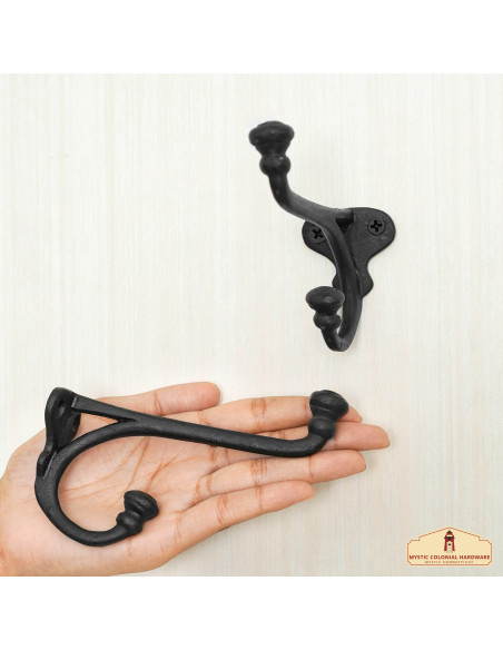 Set of 2 rustic cast iron wall hooks...