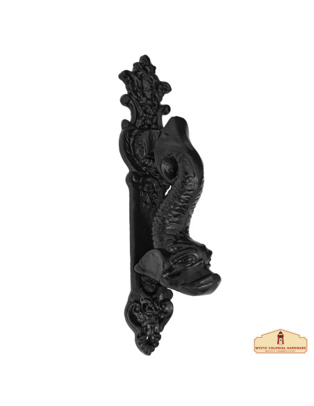 Medieval iron knocker in antique...