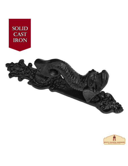 Medieval iron knocker in antique...