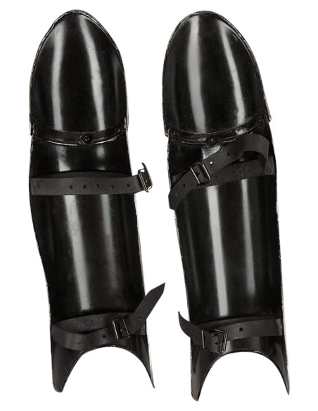 Medieval greaves blackened steel...