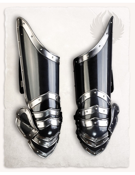 Leg armor made of blackened steel...