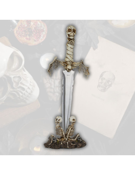 Decorative dagger with bat wings and...