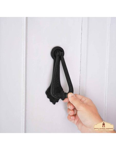 Medieval door knocker with a forged... Medieval door knocker with a forged...