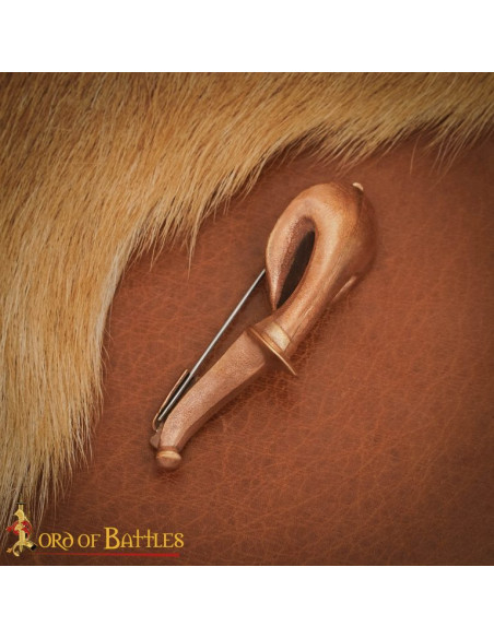 Roman bronze brooch: length 8.5 cm.