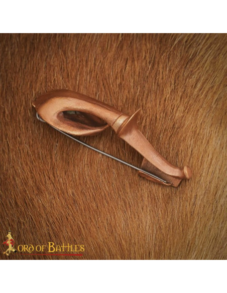 Roman bronze brooch: length 8.5 cm.