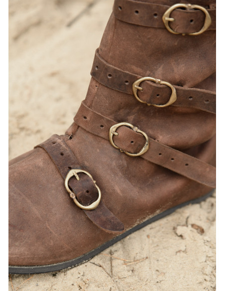 High medieval boots with buckle...