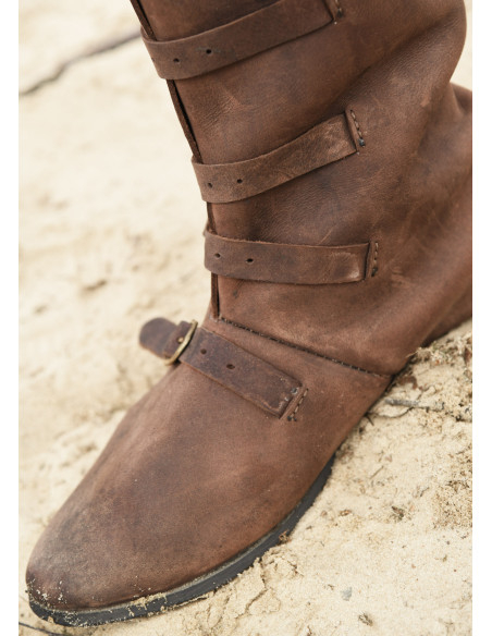 High medieval boots with buckle...