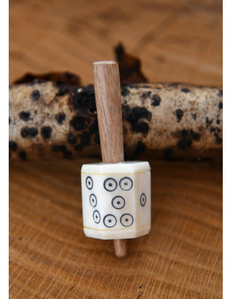 Rotating die made of bone