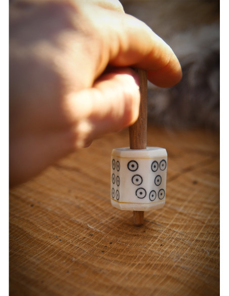 Rotating die made of bone