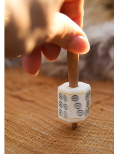 Rotating die made of bone