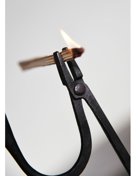 Hand-forged reed candelabrum with a...