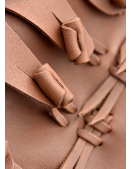 Medieval tall boots with knot...