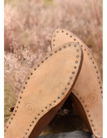 Medieval tall boots with knot...