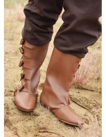 Medieval tall boots with knot...